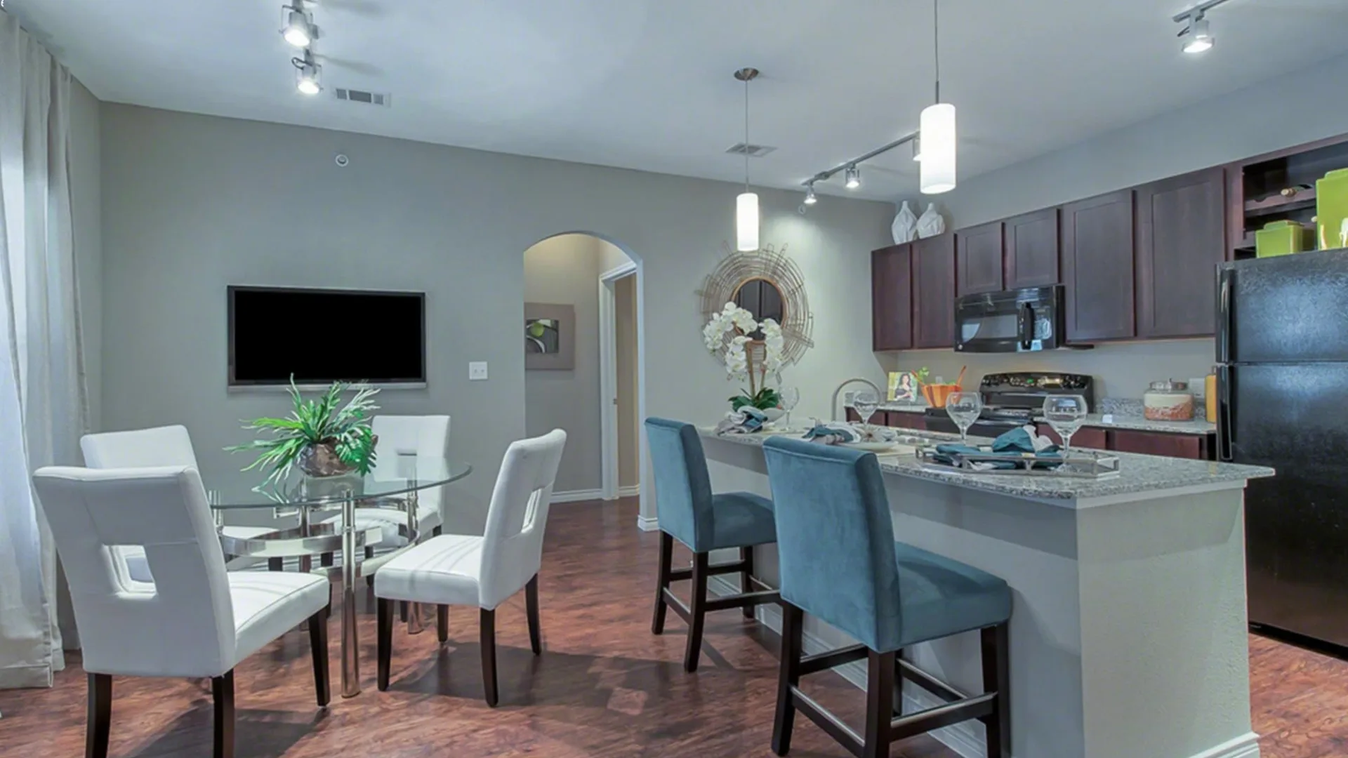 the kitchen and dining area of a new apartment at The Latigo at Eagle Pass